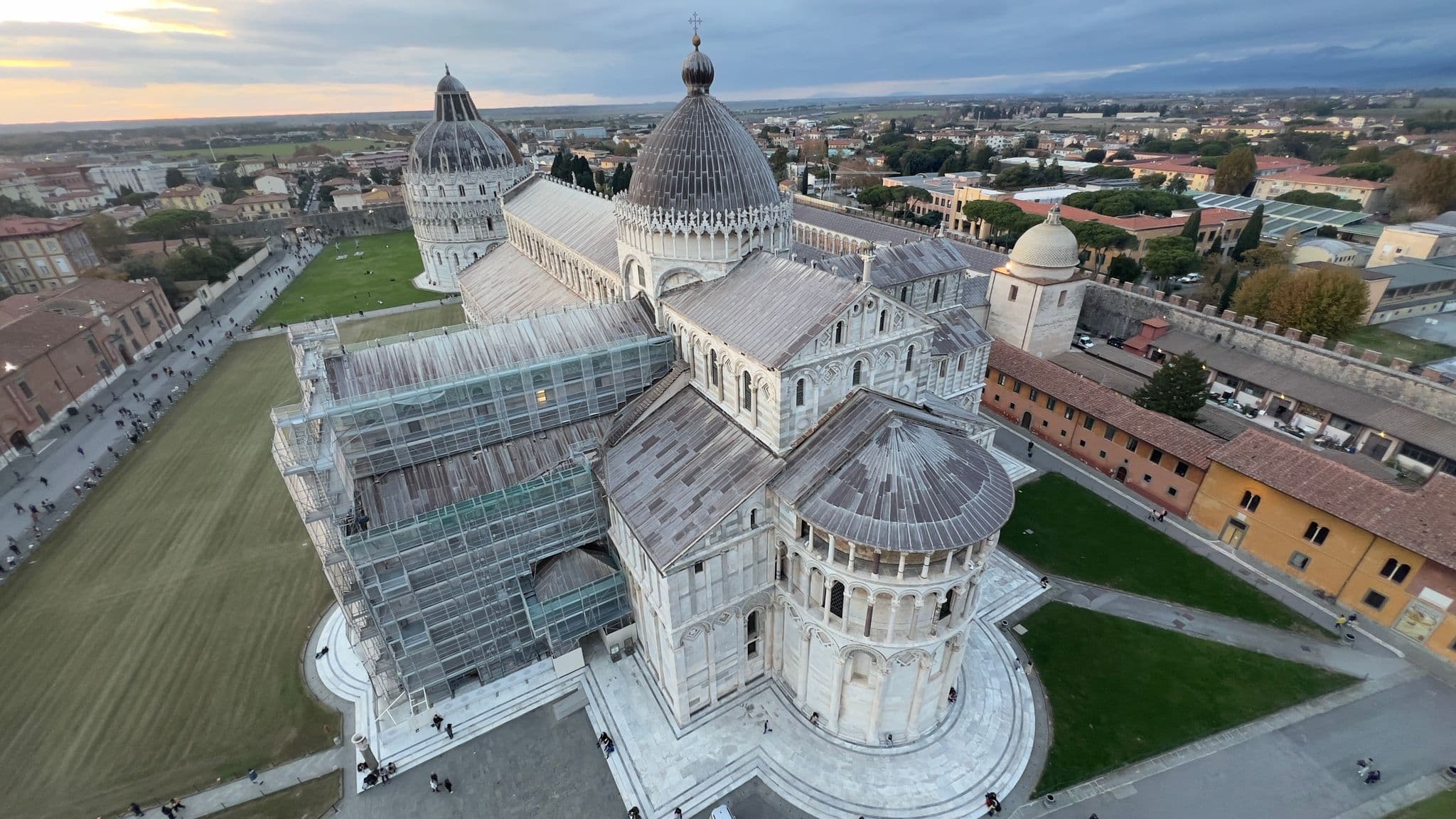 Pisa Cathedral and Baptistery seen from the Leaning Tower, aerial view over Piazza del Duomo, Pisa, Italy.