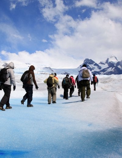 people hiking in patagonia landscape
