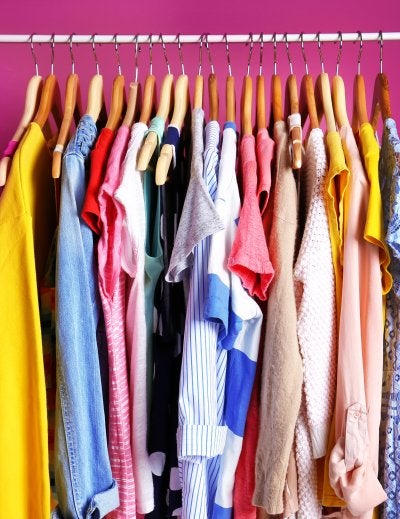 Fashion clothing on hangers at the showroom