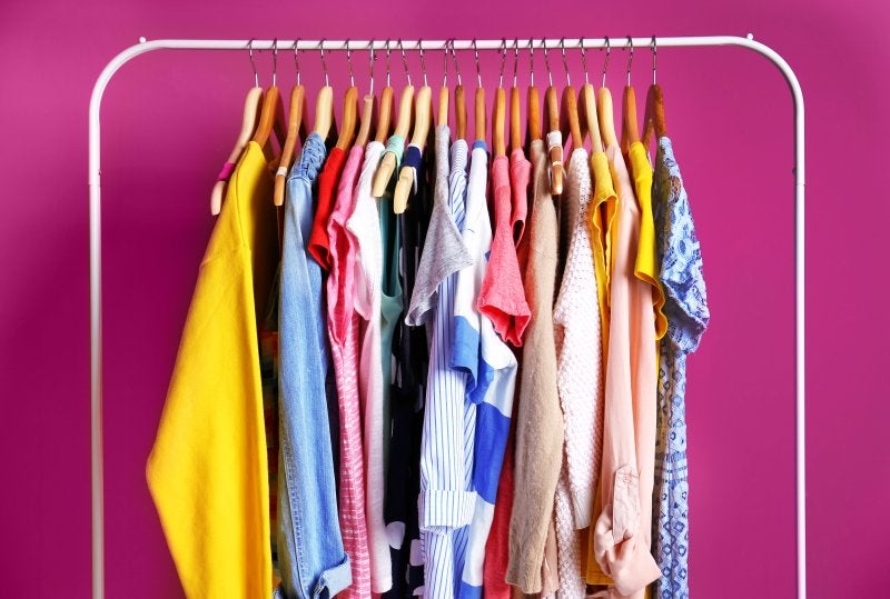 Fashion clothing on hangers at the showroom