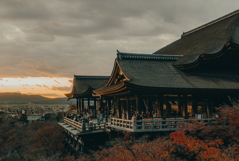 Bright autumn colors along Kyoto's Oi River during festival