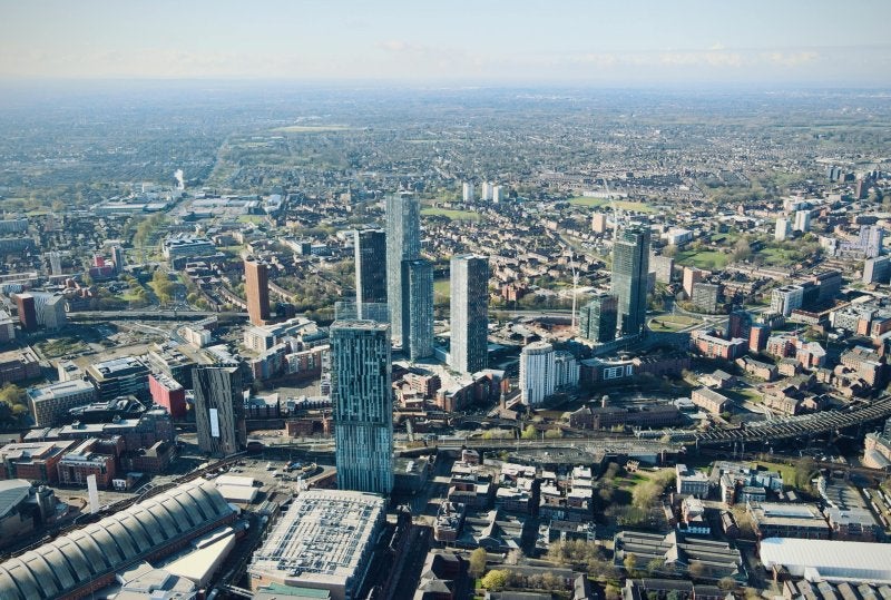 Manchester skyline aerial view with modern towers and city center