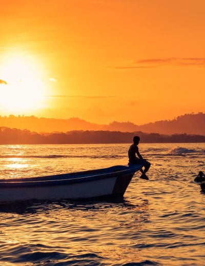 People swimming at the beach in Puerto Viejo