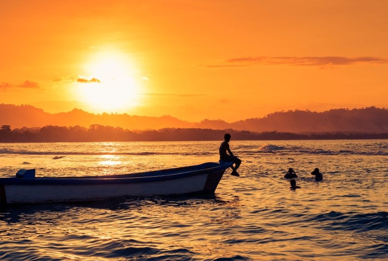 People swimming at the beach in Puerto Viejo