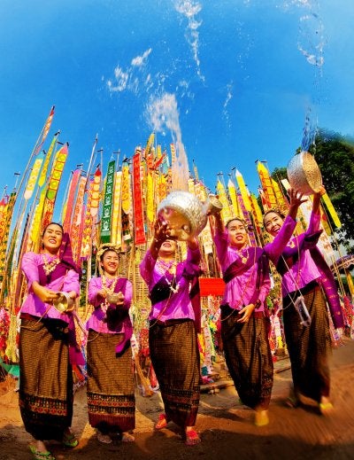 The beautiufl woman thai people celebrate Songrkan Festival