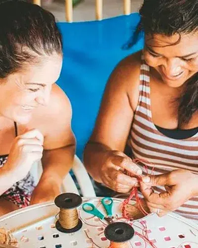 2 women in a coconut workshop in Colombia