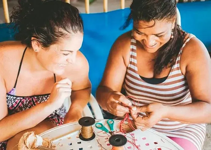 2 women in a coconut workshop in Colombia