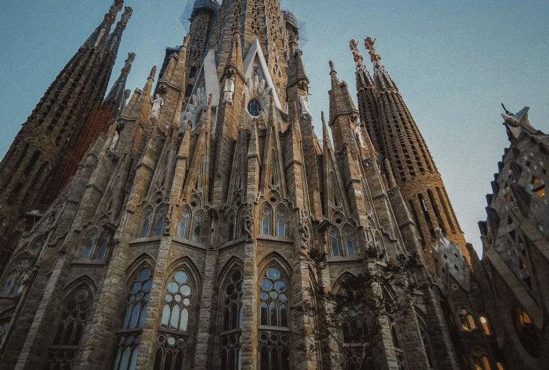 Panoramic sunset view of the Barcelona skyline and Sagrada Família