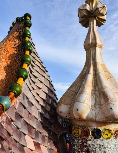 Colorful ceramic dragon-back tiles on the rooftop of Casa Batlló in Barcelona